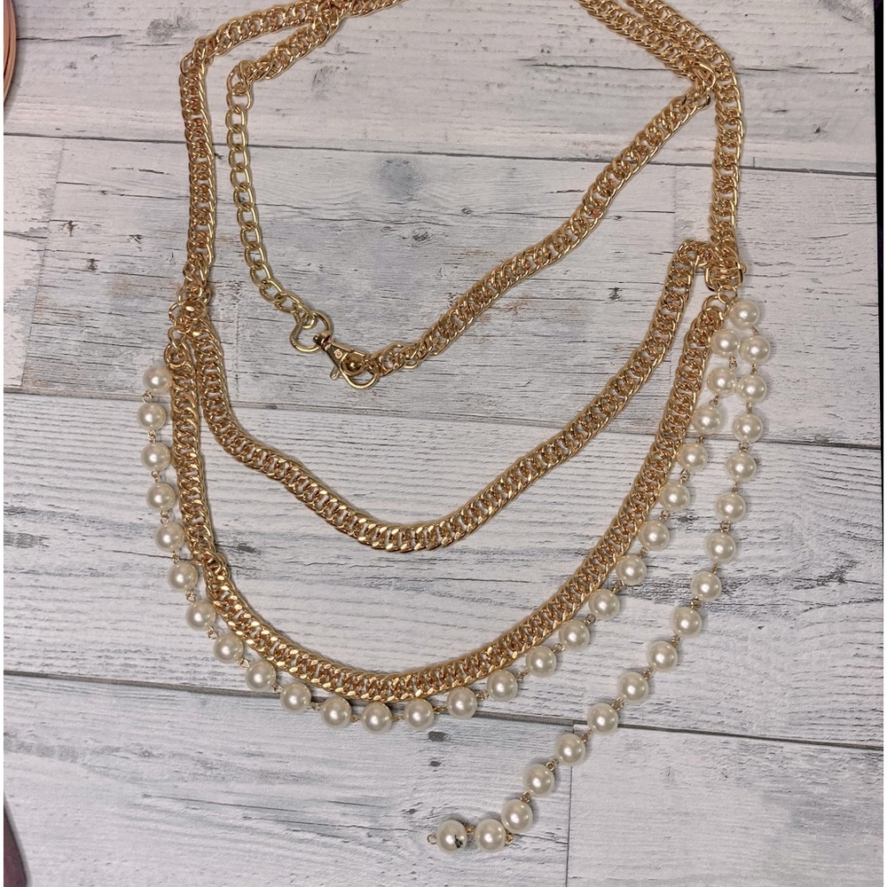 Beautiful gold tone metal and pearl belt